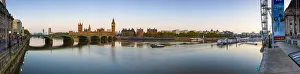 The Houses of Parliament & The River Thames illuminated at dawn The Houses of Parliament & The River Thames illuminated at dawn