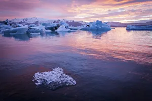 Iceland, Jokulsarlon Glacier Lagoon, icebergs and ice chunk at sunset Iceland, Jokulsarlon Glacier Lagoon, icebergs and ice chunk at sunset