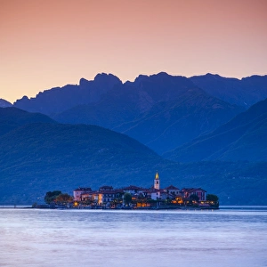 The idyllic Isola dei Pescatori (Fisherman's Islands) illuminated at dusk, Borromean Islands The idyllic Isola dei Pescatori (Fisherman's Islands) illuminated at dusk, Borromean Islands