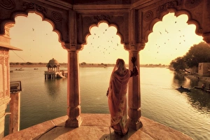 India, Rajasthan, Jaisalmer, Gadi Sagar Lake, Indian Woman wearing traditional Saree India, Rajasthan, Jaisalmer, Gadi Sagar Lake, Indian Woman wearing traditional Saree