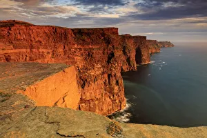 Ireland, Clare county, Cliffs of Moher at sunset Ireland, Clare county, Cliffs of Moher at sunset