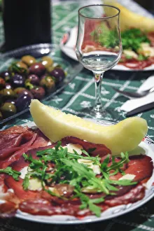 Italy, Naples, Traditional Antipasto with Prosciutto (Cured Ham) and Honeydew Melon Italy, Naples, Traditional Antipasto with Prosciutto (Cured Ham) and Honeydew Melon