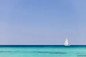 Italy, Sardinia, Olbia-Tempo, Berchidda. A sailing boat out at sea Italy, Sardinia, Olbia-Tempo, Berchidda. A sailing boat out at sea