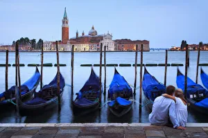 Italy, Veneto, Venice, Sestier of San Marco, Moored gondolas with San Giorgio Maggiore Italy, Veneto, Venice, Sestier of San Marco, Moored gondolas with San Giorgio Maggiore