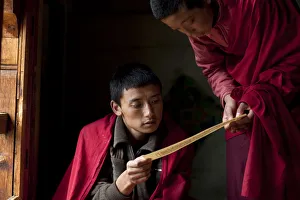 Jakar, Bhutan. Monks at the Jakar Dzong in Bhutan Jakar, Bhutan. Monks at the Jakar Dzong in Bhutan