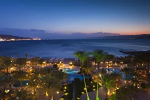 Jordan, Aqaba, elevated view of the Red Sea and hotel swimming pool Jordan, Aqaba, elevated view of the Red Sea and hotel swimming pool