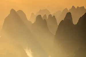 Karst limestone peaks of Yangshou and the Li River, Guangxi Yangshuo, China Karst limestone peaks of Yangshou and the Li River, Guangxi Yangshuo, China