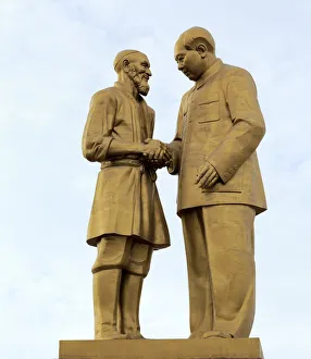 Kurban Tulum and Chairman Mao Zedong Monument, Unity Square, Hotan, Hotan Prefecture Kurban Tulum and Chairman Mao Zedong Monument, Unity Square, Hotan, Hotan Prefecture