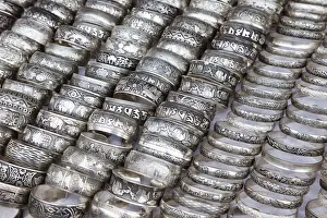 Laos, Luang Prabang, Ethnic Craft Night Market, Display of Silver Bracelets Laos, Luang Prabang, Ethnic Craft Night Market, Display of Silver Bracelets