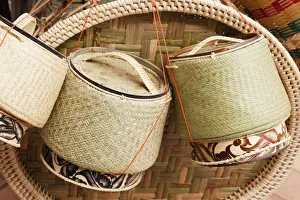 Laos, Vientiane, Basketware Street Vendors Display of Sticky Rice Containers Laos, Vientiane, Basketware Street Vendors Display of Sticky Rice Containers