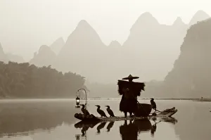 Li River / Cormorant Fisherman / Dawn, Guilin / Yangshou, Guangxi Province, China Li River / Cormorant Fisherman / Dawn, Guilin / Yangshou, Guangxi Province, China