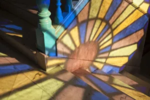 Light falling through stained glass window, in a Casa in Habana Vieja, Havana, Cuba Light falling through stained glass window, in a Casa in Habana Vieja, Havana, Cuba