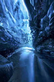 Light games inside an ice cave in Vatnajokull National Park, Iceland Light games inside an ice cave in Vatnajokull National Park, Iceland