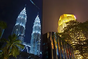 Low angle reflected iew of the Petronas Twin Towers, Kuala Lumpur, Malaysia Low angle reflected iew of the Petronas Twin Towers, Kuala Lumpur, Malaysia