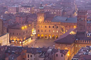 Maggiore square in Bologna old town from Asinelli tower during twilight Maggiore square in Bologna old town from Asinelli tower during twilight