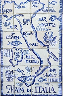 Map of Italy and the Mediterranean made out of ceramic tiles on a street in Seville Map of Italy and the Mediterranean made out of ceramic tiles on a street in Seville