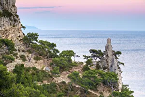 Mediterranean landscape at Calanque de Sugiton at sunset, Parc National des Calanques Mediterranean landscape at Calanque de Sugiton at sunset, Parc National des Calanques