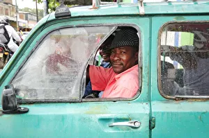 Two men in traffic in Puerto Tejada, Colombia, South America Two men in traffic in Puerto Tejada, Colombia, South America
