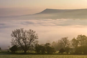Images Dated 25th February 2015: Mist covered Brecon Beacons landscape at dawn, Powys, Wales, UK
