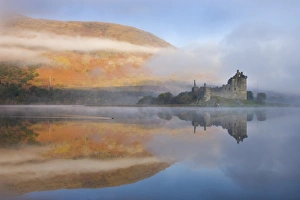 A misty morning beside Loch Awe with views to Kilchurn Castle, Argyll & Bute, Scotland A misty morning beside Loch Awe with views to Kilchurn Castle, Argyll & Bute, Scotland