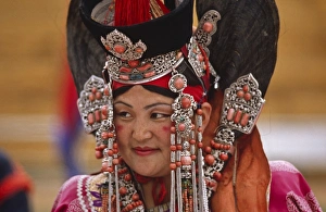 Prints of Mongolia, Ulan Bator. Woman wearing a traditional headdress and jewellery at the Pan Mongolian Festival Related Prints: Mongolian Woman in Traditional Headdress Print