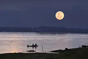 Full Moon over the Amazon River, near Puerto Narino, Colombia Full Moon over the Amazon River, near Puerto Narino, Colombia