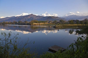 Nepal, Pokhara, Annapurna range reflecting in Phewa Lake Nepal, Pokhara, Annapurna range reflecting in Phewa Lake