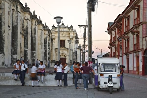 Nicaragua, Leon, Schoolchildren sitting on wall of Leon Cathedral, known as Basilicade la Asuncion Nicaragua, Leon, Schoolchildren sitting on wall of Leon Cathedral, known as Basilicade la Asuncion