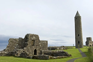 Northern Ireland, Fermanagh, Enniskillen. Tthe monastic settlement and round tower on Devenish Island in Lower Northern Ireland, Fermanagh, Enniskillen. Tthe monastic settlement and round tower on Devenish Island in Lower