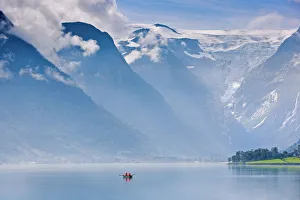 Norway, Western Fjords, Nordfjord, people in rowing boat Norway, Western Fjords, Nordfjord, people in rowing boat