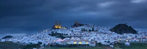 Andalusia Spain Prints: Olvera illuminated at dusk, Olvera, Cadiz Province, Andalusia, Spain