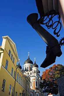 An Ornamental Steel Boot hangs infront of the 19th An Ornamental Steel Boot hangs infront of the 19th