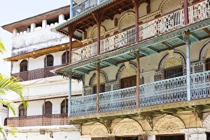 Ornate balconies on restored buildings in old Stone Town, Zanzibar, Tanzania Ornate balconies on restored buildings in old Stone Town, Zanzibar, Tanzania