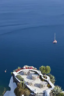 Outdoor dining area, Oia, Santorini, Cyclades islands, Greece Outdoor dining area, Oia, Santorini, Cyclades islands, Greece