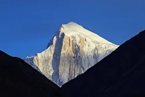 Pakistan, Gilgit-Baltistan, Hunza Valley, Karimabad. Golden Peak, also known as Spantik Pakistan, Gilgit-Baltistan, Hunza Valley, Karimabad. Golden Peak, also known as Spantik
