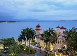 Prints of Palacio de Valle at dusk, elevated view, Cienfuegos, Cienfuegos Province, Cuba Related Prints: Cienfuegos Cuba Palacio de Valle Print at Dusk