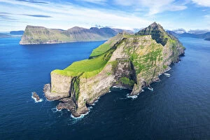 Denmark Collection: Panoramic aerial view of the island of Kalsoy with the Kallur lighthouse cliff in the foreground