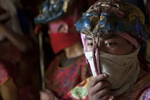 Participants and spectators prepare for the Tsechu at Thangbi Mani monastery in Bhutan Participants and spectators prepare for the Tsechu at Thangbi Mani monastery in Bhutan
