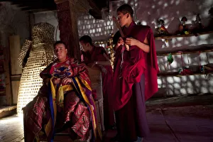 Participants at the tsechu in Wangdue Phodrang getting ready for a performance Participants at the tsechu in Wangdue Phodrang getting ready for a performance