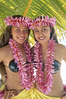 Polynesian Girls Dressed in Traditional Costume with Leis Polynesian Girls Dressed in Traditional Costume with Leis