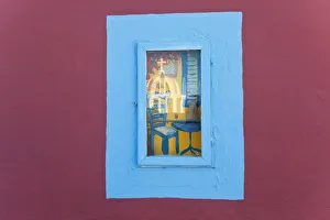 Reflection of church in picture window, Santorini (Thira), Cyclades, Greece Reflection of church in picture window, Santorini (Thira), Cyclades, Greece
