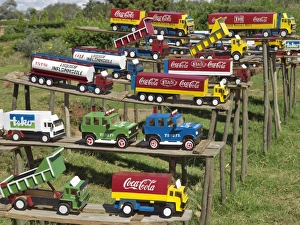 Replica trucks and lorries for sale at a roadside stall Replica trucks and lorries for sale at a roadside stall