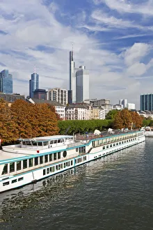River scene with frankfurt skyline in background, Frankfurt am Main, Hesse, Germany River scene with frankfurt skyline in background, Frankfurt am Main, Hesse, Germany
