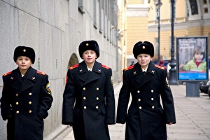 Russia, St. Petersburg; Three young cadets walking in the main streets of the city Russia, St. Petersburg; Three young cadets walking in the main streets of the city