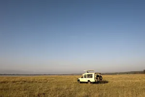 Safari vehicle with tourist in Lake Elementaita, Kenya Safari vehicle with tourist in Lake Elementaita, Kenya
