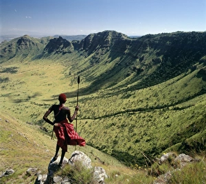 A Samburu warrior looks out across the eastern scarp A Samburu warrior looks out across the eastern scarp