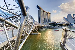 Singapore, the Helix bridge leading across Marina Bay to the Marina Bay Sands hotel Singapore, the Helix bridge leading across Marina Bay to the Marina Bay Sands hotel