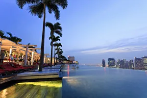 Singapore, swimmingpool and Singapore Skyline on the 57th floor of Marina Bay Sands Singapore, swimmingpool and Singapore Skyline on the 57th floor of Marina Bay Sands