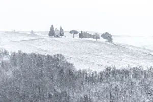 The small chapel of Madonna di Vitaleta appearing in the blizzard during a winter The small chapel of Madonna di Vitaleta appearing in the blizzard during a winter