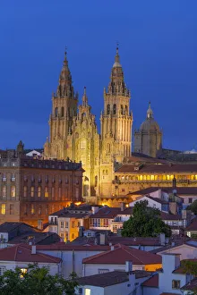 Spain, Galicia, Santiago de Compostela, view over rooftops to cathedral illuminated Spain, Galicia, Santiago de Compostela, view over rooftops to cathedral illuminated